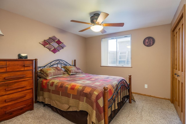 N8343 Mcwain Dr, Holland Twp, WI 54636 - bedroom with a closet, light carpet, and a ceiling fan