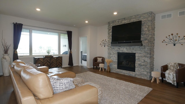 1872 Oakpointe Dr, Waconia, MN 55387 - living area with wood finished floors, a stone fireplace, and recessed lighting