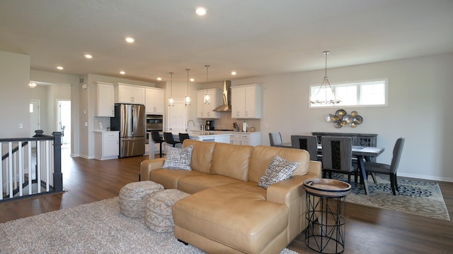 1872 Oakpointe Dr, Waconia, MN 55387 - living room with a chandelier, dark wood-style floors, and recessed lighting