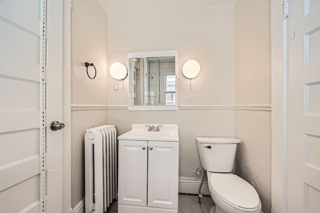 3148 Pleasant Ave, Minneapolis, MN 55408 - bathroom featuring radiator heating unit and vanity