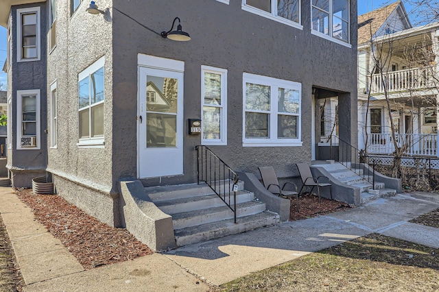 3148 Pleasant Ave, Minneapolis, MN 55408 - doorway to property with stucco siding