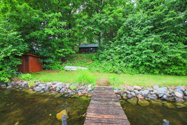 1962 81st St, Balsam Lake, WI 54810 - view of yard featuring an outdoor structure and a boat dock