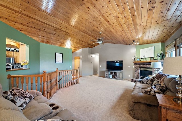 20604 Jasmine Path, Lakeville, MN 55044 - carpeted living area with ceiling fan, wood ceiling, a brick fireplace, and lofted ceiling