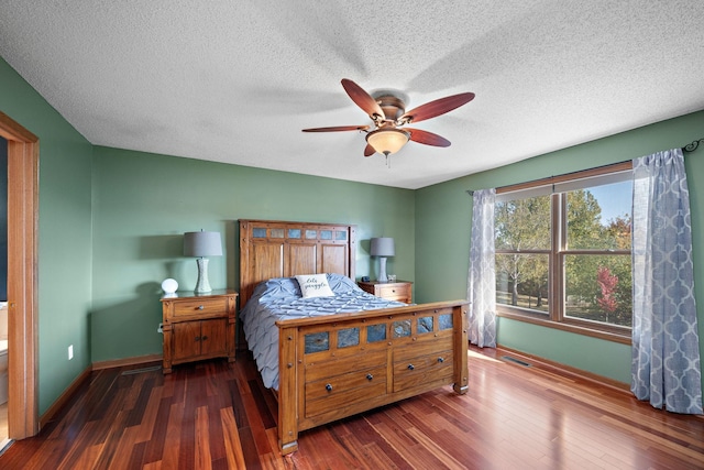 20604 Jasmine Path, Lakeville, MN 55044 - bedroom with wood finished floors, a textured ceiling, and a ceiling fan