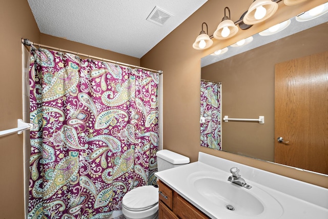 20604 Jasmine Path, Lakeville, MN 55044 - full bathroom with vanity, curtained shower, and a textured ceiling