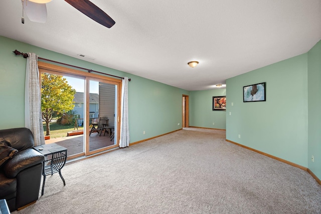 20604 Jasmine Path, Lakeville, MN 55044 - unfurnished living room with carpet and ceiling fan