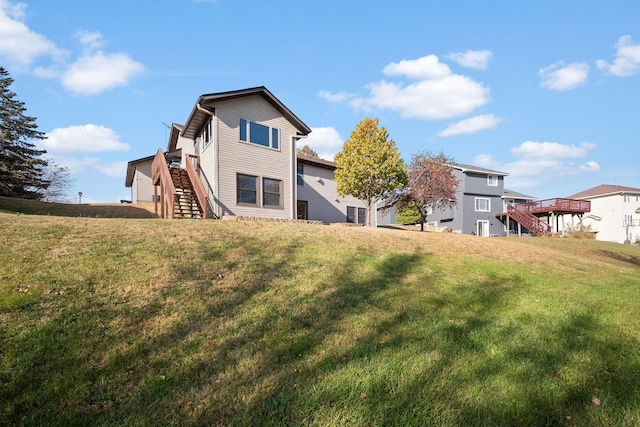 20604 Jasmine Path, Lakeville, MN 55044 - rear view of house featuring stairway, a yard, and a deck