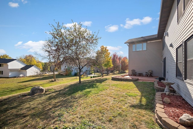 20604 Jasmine Path, Lakeville, MN 55044 - view of grassy yard featuring a patio