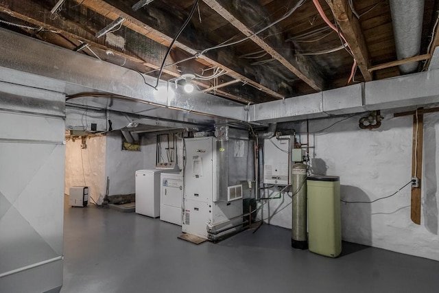 500 Sherman St, North Mankato, MN 56003 - unfinished below grade area with washing machine and clothes dryer, a water softener system, and tankless water heater