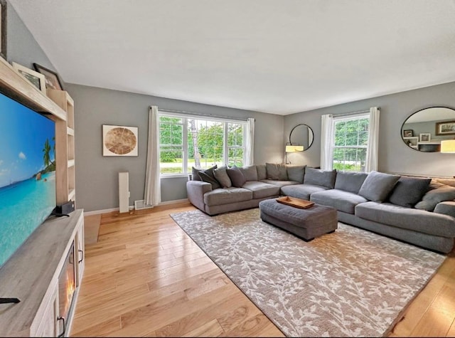 315 32nd St, Grand Rapids, MN 55744 - living room with light wood-type flooring and baseboards