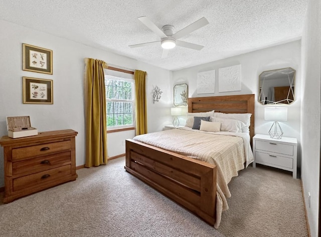 315 32nd St, Grand Rapids, MN 55744 - carpeted bedroom featuring a textured ceiling and a ceiling fan