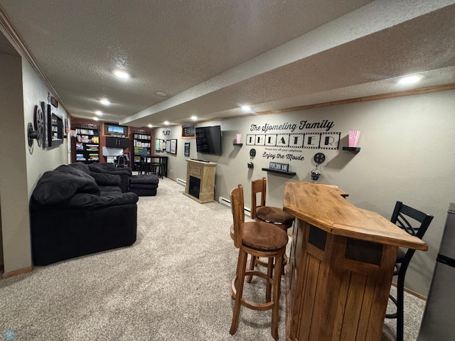 418 4th Ave W, Lisbon, ND 58054 - dining room with a textured ceiling, a bar, carpet, a baseboard radiator, and recessed lighting