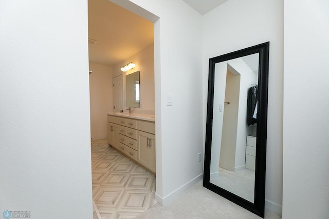 7328 Aquiline Dr S, Fargo, ND 58104 - full bath with double vanity and baseboards