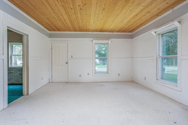 196 Beaulieu St W, Motley, MN 56466 - unfurnished room featuring wooden ceiling, plenty of natural light, and brick wall