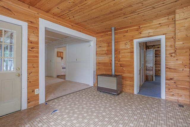 196 Beaulieu St W, Motley, MN 56466 - unfurnished room featuring wooden walls, wood ceiling, and heating unit