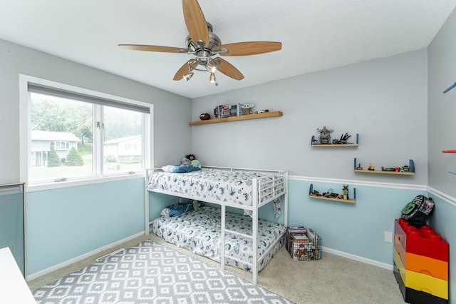 5520 25th Ave NW, Rochester, MN 55901 - bedroom with carpet flooring and a ceiling fan