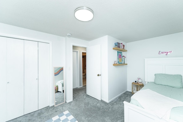 5520 25th Ave NW, Rochester, MN 55901 - bedroom with light colored carpet, a closet, and a textured ceiling