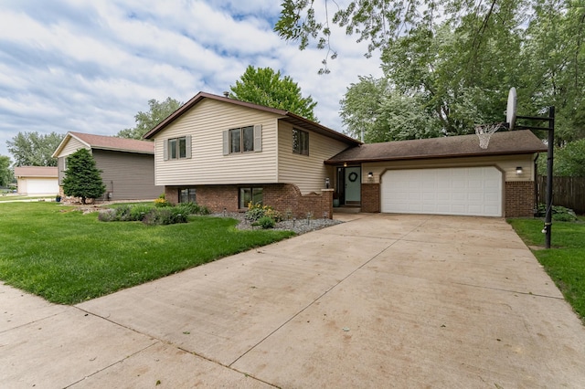 5520 25th Ave NW, Rochester, MN 55901 - tri-level home with brick siding, a garage, and driveway