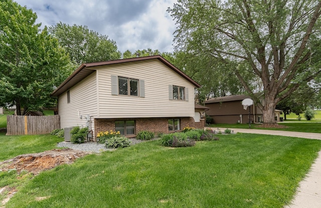 5520 25th Ave NW, Rochester, MN 55901 - view of property exterior with a cooling unit and brick siding