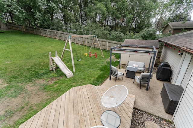 5520 25th Ave NW, Rochester, MN 55901 - wooden terrace with a playground, a fenced backyard, an outdoor hangout area, and area for grilling