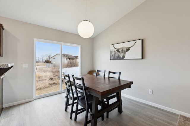 945 Breckenridge Ln, Montrose, MN 55363 - dining space with wood finished floors and lofted ceiling