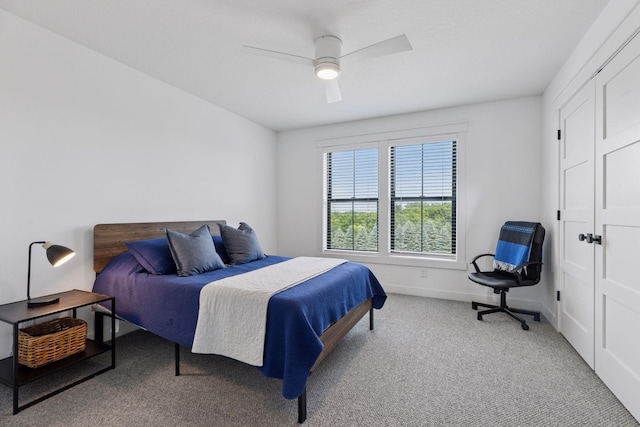7568 Glen Alcove, Woodbury, MN 55129 - carpeted bedroom featuring baseboards and ceiling fan