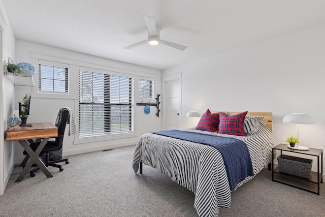 7568 Glen Alcove, Woodbury, MN 55129 - bedroom featuring carpet, multiple windows, a desk, and a ceiling fan