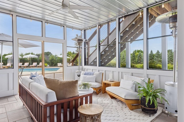 7568 Glen Alcove, Woodbury, MN 55129 - sunroom / solarium with ceiling fan and an outdoor hangout area