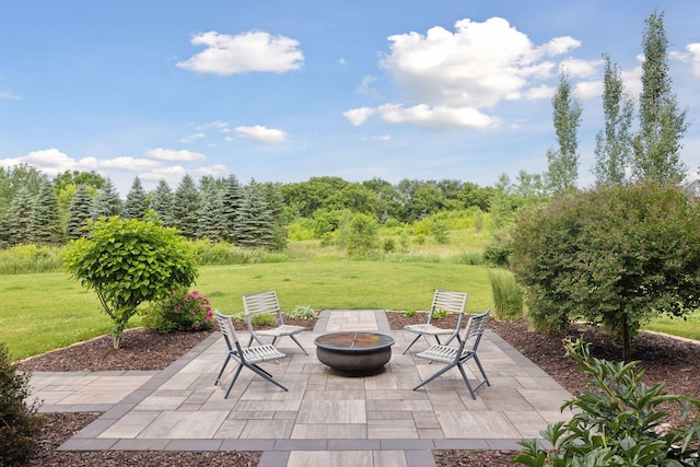 7568 Glen Alcove, Woodbury, MN 55129 - view of patio / terrace featuring a fire pit