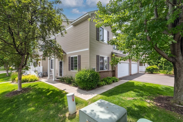 451 Frederick Cir Unit 1405, Hastings, MN 55033 - view of front of house featuring a front lawn and asphalt driveway