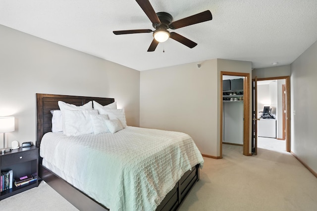 451 Frederick Cir Unit 1405, Hastings, MN 55033 - bedroom featuring light carpet, ceiling fan, and a walk in closet