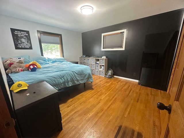 1520 6th St, Montevideo, MN 56265 - bedroom featuring wood finished floors and baseboards