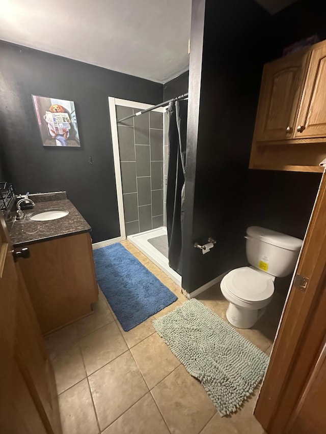 1520 6th St, Montevideo, MN 56265 - bathroom with tile patterned flooring, vanity, and a stall shower