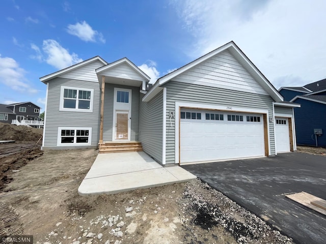19943 English Ln N, Forest Lake, MN 55025 - view of front of house featuring driveway and a garage