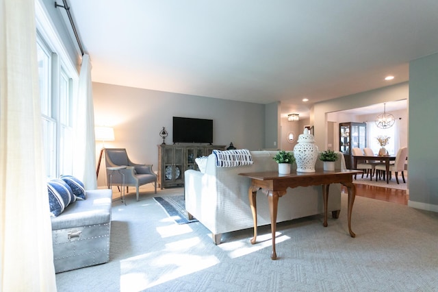 6045 Galpin Lake Rd, Shorewood, MN 55331 - living room with a chandelier, carpet, and recessed lighting