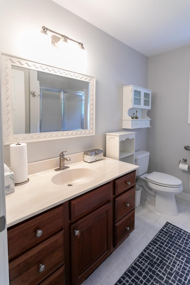 6045 Galpin Lake Rd, Shorewood, MN 55331 - full bathroom featuring vanity, an enclosed shower, and tile patterned flooring