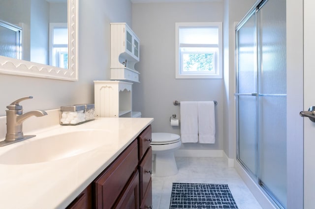 6045 Galpin Lake Rd, Shorewood, MN 55331 - full bath with a shower stall, vanity, and tile patterned flooring