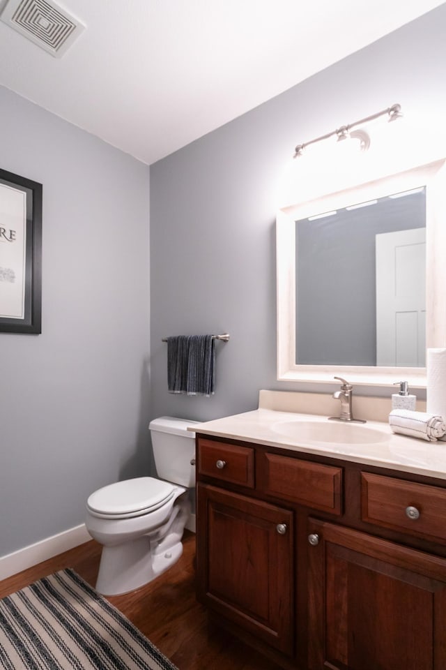 6045 Galpin Lake Rd, Shorewood, MN 55331 - half bath with wood finished floors and vanity