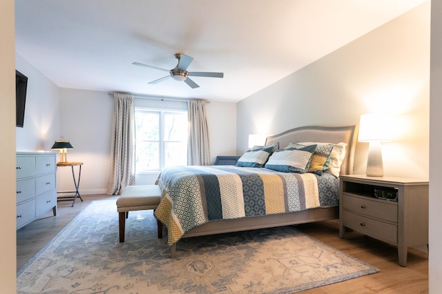 6045 Galpin Lake Rd, Shorewood, MN 55331 - bedroom featuring wood finished floors and a ceiling fan