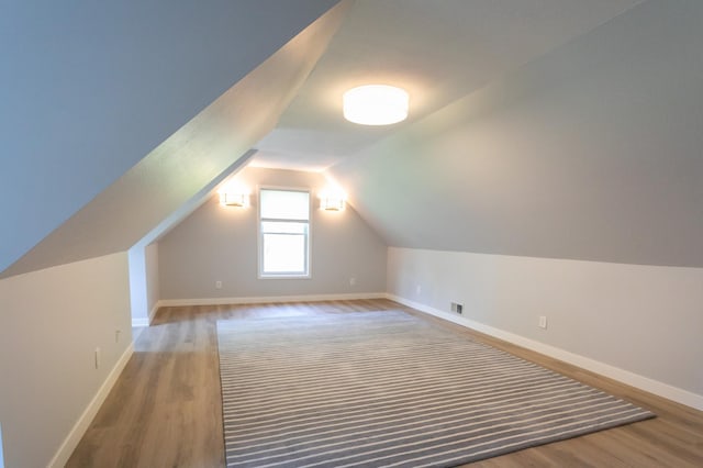 6045 Galpin Lake Rd, Shorewood, MN 55331 - bonus room with wood finished floors and vaulted ceiling