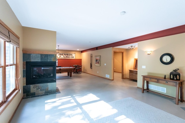 6045 Galpin Lake Rd, Shorewood, MN 55331 - living room featuring a fireplace and baseboards