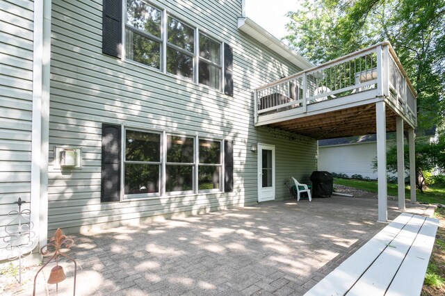6045 Galpin Lake Rd, Shorewood, MN 55331 - back of house with a patio area and a deck