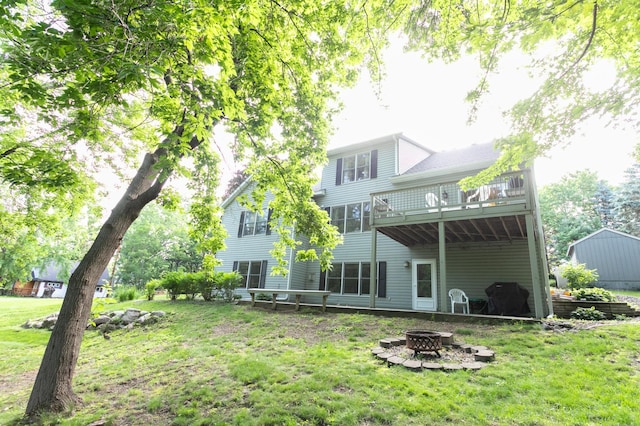 6045 Galpin Lake Rd, Shorewood, MN 55331 - back of property featuring a fire pit and a lawn