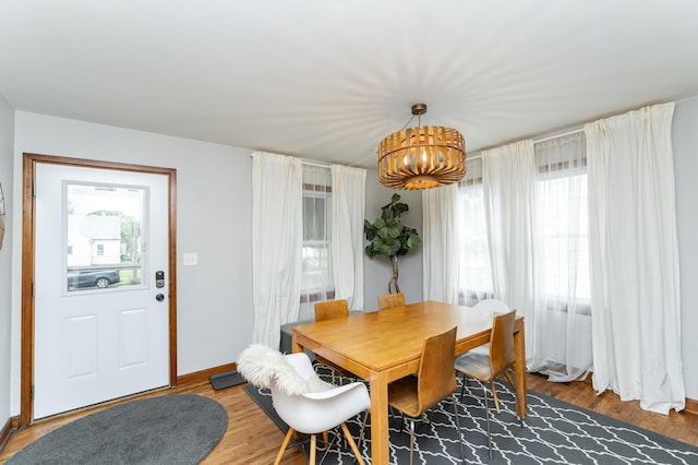 1130 4th Ave SE, Rochester, MN 55904 - dining space with a chandelier and light wood-style floors
