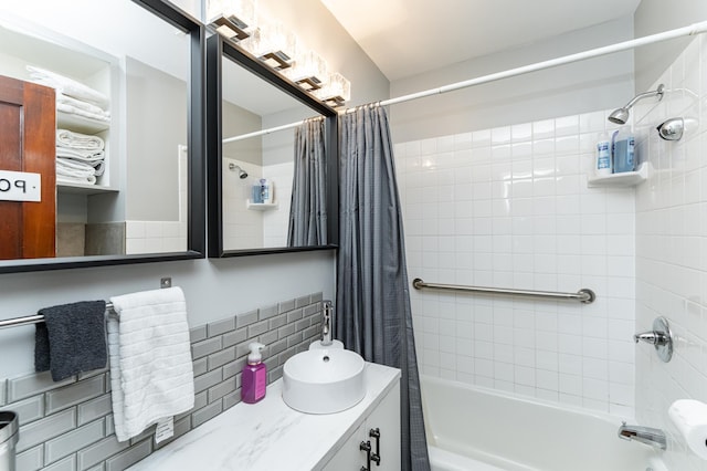 1130 4th Ave SE, Rochester, MN 55904 - full bathroom with vanity, shower / bathtub combination with curtain, and decorative backsplash