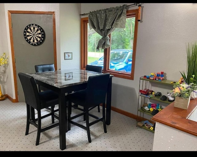 901 Prince St, Mountain Lake, MN 56159 - dining area featuring baseboards