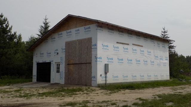 21057 US Highway 2, Grand Rapids, MN 55744 - garage featuring driveway