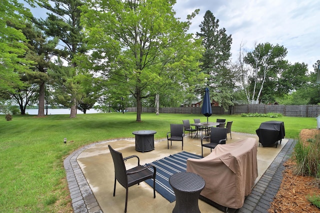 10032 Long Lake Rd, Brainerd, MN 56401 - view of patio featuring outdoor dining space and a grill