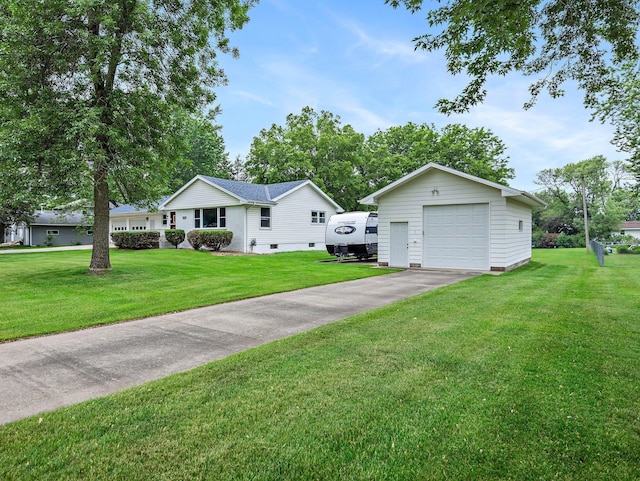 3945 8th Ave NW, Anoka, MN 55303 - single story home with a detached garage, an outdoor structure, asphalt driveway, and a front yard