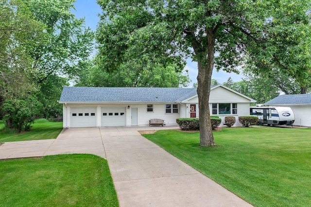 3945 8th Ave NW, Anoka, MN 55303 - single story home featuring concrete driveway, an attached garage, a front lawn, and roof with shingles
